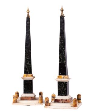 Rome, 18th century, Pair of obelisks Polychrome marbles with base structure and crown of lanceolate leaves.     