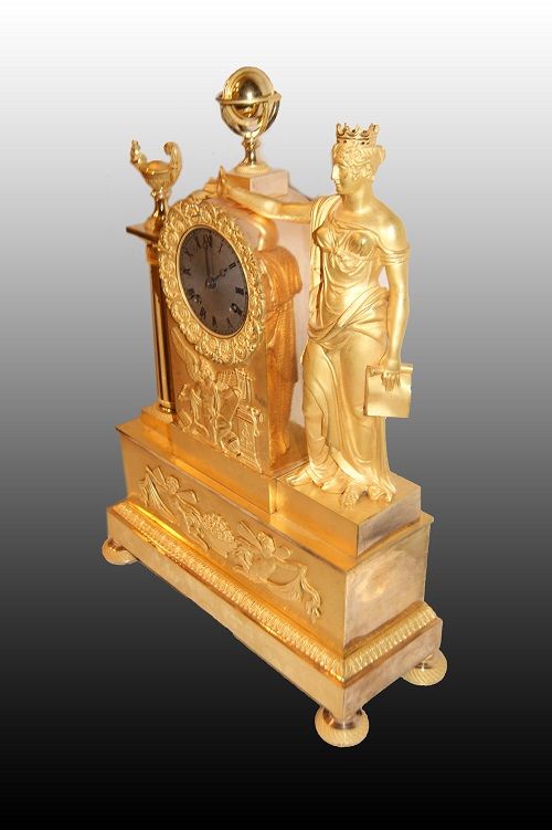 Orologio in bronzo dorato stile Impero del 1800