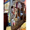 Libreria etnica in madre perla e osso. Misure ( h 230 cm x larg. 170 cm x prof. 55 cm ). 