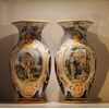 Coppia di vasi in maiolica raffinatamente decorati con allegorie delle Arti