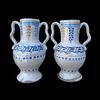 Coppia di vasi in maiolica con manici laterali a nastro e decori geometrici stilizzati.Manifattura di Grottaglie.Puglia.