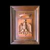 Pannello in legno di noce  con applicato stemma nobiliare con  figura di aquila e corona in altorilievo.