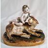 Figura in porcellana "Putto su leopardo".