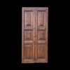 Coppia di porte in legno di castagno massello con formelle romboidali incise in altorilievo.