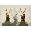 Coppia di candelieri in bronzo dorato e patinato raffiguranti baccanale di satiri, montati a lampada. Francia XIX secolo