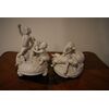 Coppia di antiche statuine in porcellana Biscuit francese del 1800 raffiguranti animali e putti