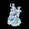 Gruppo in porcellana raffigurante bambini musicanti.Meissen