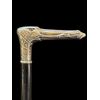 Bastone con impugnatura in argento raffigurante testa di coccodrillo in stile art nouveau con canna in ebano puntato.Germania.