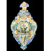 Acquasantiera in maiolica con decoro a motivi geometrici e vegetali stilizzati,putti e medaglione centrale con croce.Cerreto Sannita.