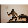 Grande scultura Decò in bronzo e marmo Raffigurante Uomo Primitivo con Ariete