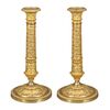 Coppia di candelieri in bronzo dorato. Parigi, inizi XIX sec.