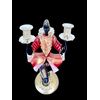 Candeliere in vetro a due fiamme raffigurante figura di moro inginocchiato con inclusione foglia oro.A.Ve.M Murano.