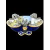 Centrotavola trilobato in maiolica policroma con decoro istoriato e manici a forma di serpente.Ginori