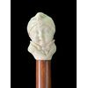 Bastone con pomolo in avorio raffigurante busto di fanciullo.