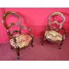 Pair of armchairs with open backrest