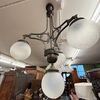 Antico Lampadario in ferro battuto e ottone Liberty 1930 con 4 bocce vetro.  Mis : Altezza cm 108 diametro cm 60 