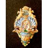 Holy water stoup in majolica with shell motifs, angels, cherubs and cross in the center. Manufacture of Vietri, Campania.     