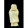 Netsuke in avorio raffigurante personaggio maschile.Giappone.