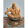 Scultura di personaggio giapponese XX sec., mis. h 26, l 26, p 26 cm