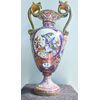 Large vase in gold and ruby luster majolica with snake and mask handles.Decorated with vegetal and oval motifs with Renaissance profiles.Gualdo Tadino.     