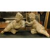  DARS641 - N. 2 statue di putti in pietra Serena, misure cm L 60 x H 57 x P 40 