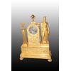Parigina orologio da tavolo francese del 1800 in bronzo dorato stile Impero con dama 