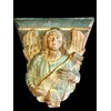 grande mensola in terracotta raffigurante Angelo con nastro. 