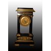 Orologio francese stile Impero del 1800 in legno ebanizzato con bronzi
