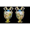 Coppia di vasi in maiolica decorati con putti in ambiente agreste.Ginori