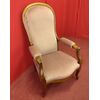 Armchair with reclining backrest