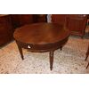 Grande tavolo circolare allungabile di inizio 1800 in legno di noce
