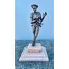 Piccola scultura in bronzo raffigurante Don Chisciotte.Base in alabastro.Russia.