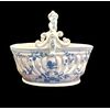 Cestino in maiolica con decoro monocromo turchino con insetti,uccelli e motivi vegetali. Ferniani,Faenza.