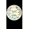 Piatto in maiolica decorato  con uccellino e motivi vegetali.Manifattura Coppellotti.Lodi.