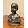 Busto di bronzo di un ragazzo dell'800