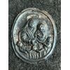 Fermaglio da tabarro in argento raffigurante Madonna con Bambino e le anime purganti.Confraternita delle anime.Genova
