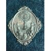 Fermaglio da tabarro in ottone raffigurante due angeli con ostensorio .Confraternita degli angeli e del santissimo Sacramento.Genova