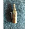Scatolina portafiammiferi in ottone a forma di bottiglia di champagne ( Veuve Cliquot) con anche trancia-sigari.Francia