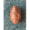 Scatolina a forma di uovo in seme di curozo con scene religiose incise.Francia