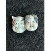 Netsuke &#39;in ivory with two faces: female face and demon. Japan     
