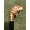 Stick with solid silver knob representing a dog&#39;s head. Ebony barrel. Italy.     