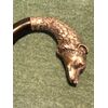 Stick with solid silver pommel depicting a dog&#39;s head. Ruby eyes. Rosewood barrel. Italian punch.     