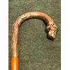 Bastone con impugnatura in argento raffigurante testa di cane. canna in noce