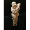 Stick with bone knob depicting a jester on a trunk Germany.     