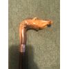 Bastone con pomolo in corno raffigurante testa di elefante,canna composta da dischi di corno su anima flessibile.