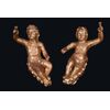 Coppia di putti antichi a tronco unico in legno dorato. Firenze fine XVII secolo.