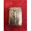 Scatolina portafiammiferi in argento senza punzone con decoro a personaggio maschile e architetture.
