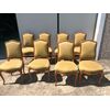 Eight Louis Philippe period cherry chairs.     