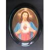 Dipinto ovale olio su tela raffigurante figura di Cristo.