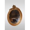 Specchiera ovale Luigi XV del 1800  francese dorata con cimasa foglia oro